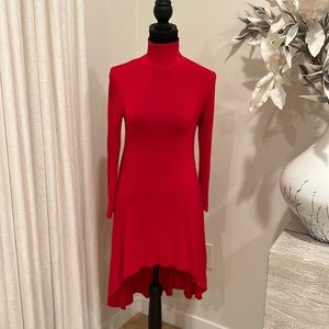 Beautiful, red dress very soft. Turtleneck, shorter front and longer back.